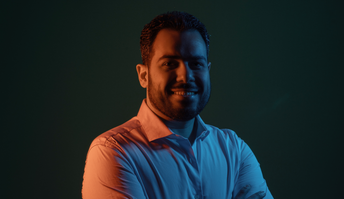 Omar Hamed in a dark background